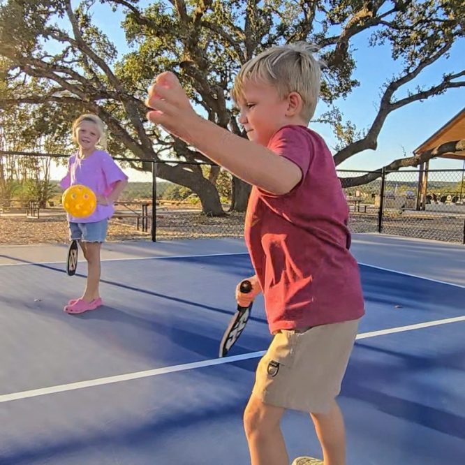 Horseshoe Ridge RV Resort  Wimberley, TX  kids playing pickleball