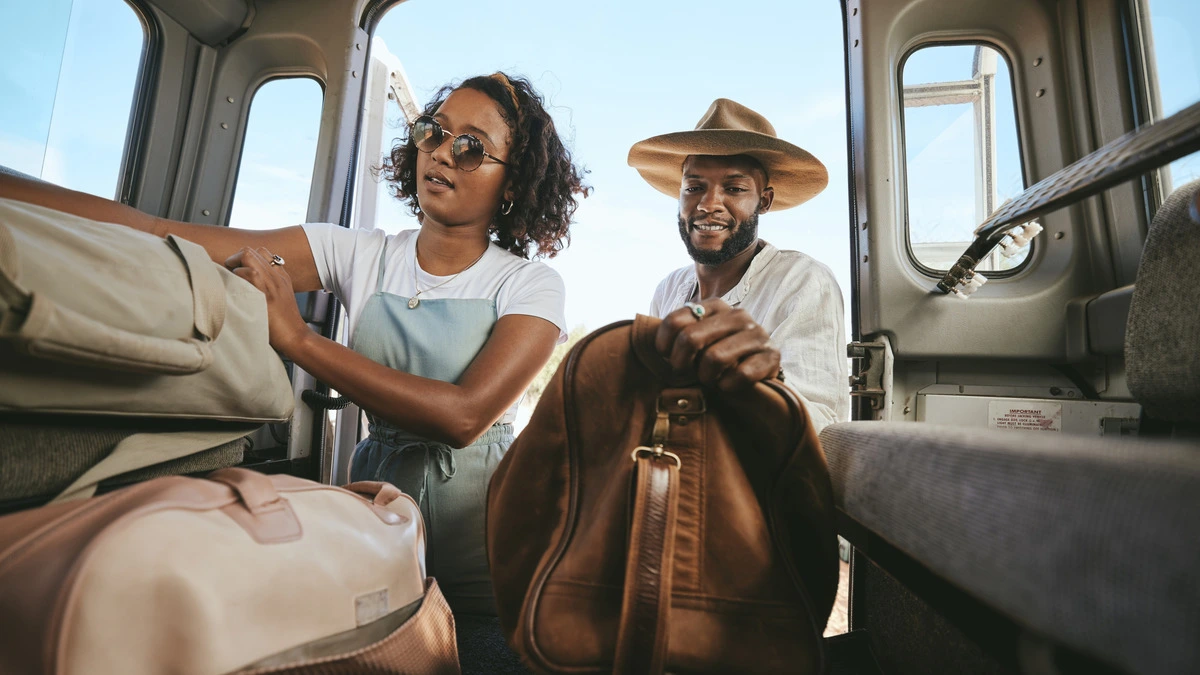 How to Plan the Perfect RV Trip to the Texas Hill Country couple packing up for a trip