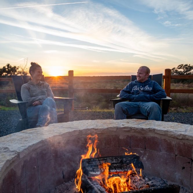 Horseshoe Ridge RV Resort couple enjoying the campfire